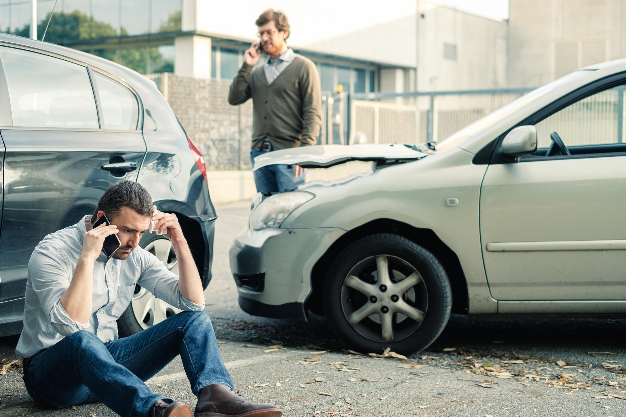 072942998-two-men-calling-car-help-assis 072942998-two-men-calling-car-help-assis